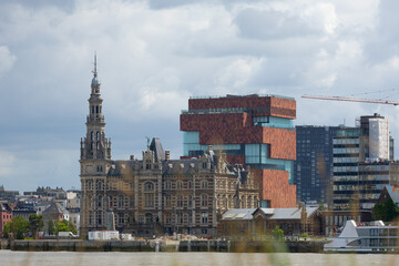 the historical building and modern building at Antwerp Scheldt river bank, Belgium