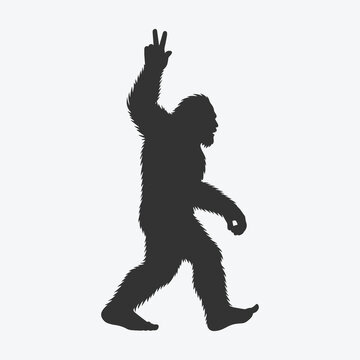 Bigfoot Silhouette with Peace Sign &ndash; Mythical Sasquatch Walking with a Positive Gesture for Fun and Unique Designs