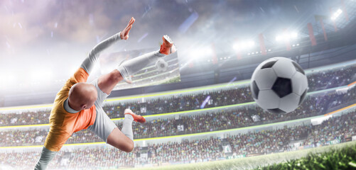 Football freestyle. Young professional football player in motion on the stadium. Football kick....