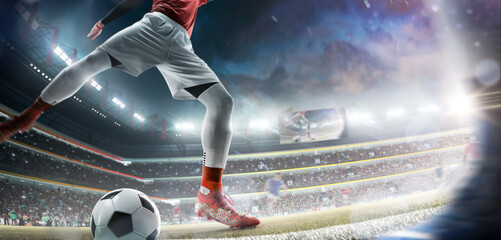 Soccer concept. Professional soccer player hits the ball for the winning goal. Wide angle. View from below. Championship. Big night stadium. Soccer arena