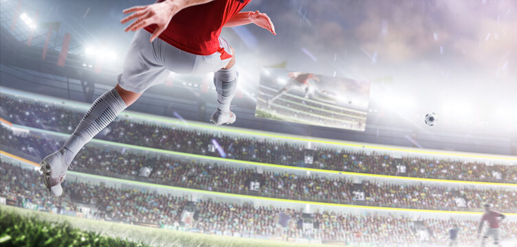 Strong soccer kick. Big night stadium. Professional soccer player in action. Back view. Soccer. Championship. The concept of sport. Soccer arena
