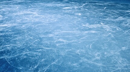 Obraz premium The pristine ice surface reflecting winter's serene beauty and textures.