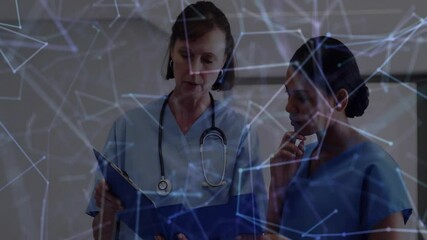 Senior nurse bringing patient chart into view in ward, network overlay guiding patient review - Powered by Adobe