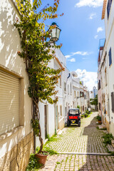 Narrow street of old town in Albufeira, Portugal