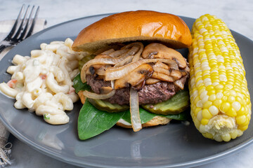onion and mushroom burger  on a brioche bun