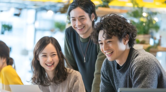 Young Professionals Sharing Laughter in Team Workspace. Generative AI
