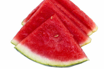 Slices of fresh watermelon arranged neatly on a white background, perfect for summer gatherings and...