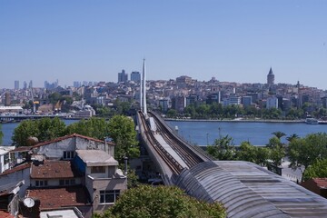 Elevated view of Istanbul metro bridge and cityscape with Galata Tower