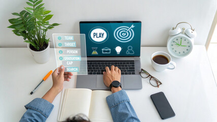 Top down view of a student using a laptop for online education