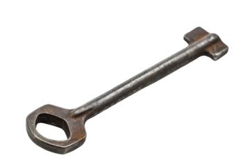 Old-fashioned rusted iron key with circular head isolated.