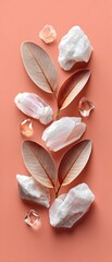 Elegant arrangement of delicate leaves and crystals on a pastel background, showcasing nature's beauty and harmony.
