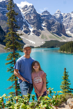 Dad and daughter visiting Moraine Lake in Banff National Park