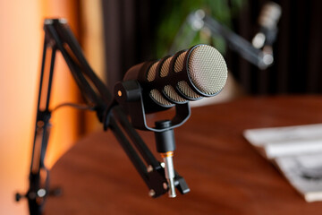 Podcast microphone setup at a recording studio promotes engaging audio discussions in a professional environment