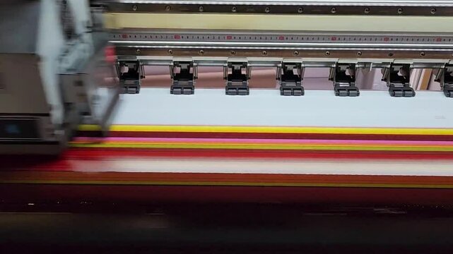 Video of digital printing machine printing on foil