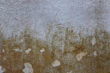 Weathered concrete wall with texture and stains