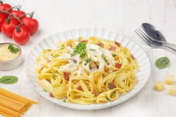 Fettuccine carbonara is a creamy pasta sauce made from a mixture of cream, cheese, and eggs.