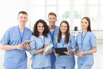Group of medical students in uniforms indoors