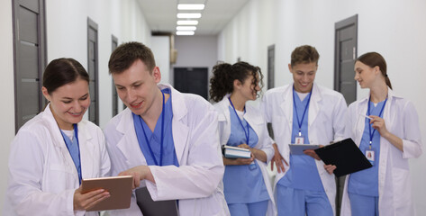 Group of medical students in uniforms indoors