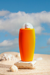 Sunblock or sunscreen in cosmetic tube on beach sand and beige background. Summer vacation and skin care concept with starfish and sea shells, spf uv-protect cosmetics. Skin health. High quality photo