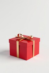 A single red present box with a gold ribbon bow, isolated on a white background, perfect for holiday or celebratory designs