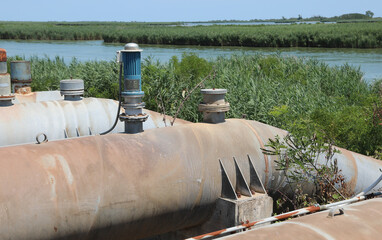pumping station with multiple steel pipelines used for canal dewatering maintaining consistent water levels or fields irrigation