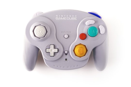Neu-Ulm, Germany - July, 02, 2025: Nintendo  Gamecube  wireless Wavebird  Game controller. High angle view isolated on white background.	