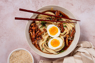 buckwheat noodles soba with shimeji mushrooms, with boiled egg, green onion, sesame seeds,...