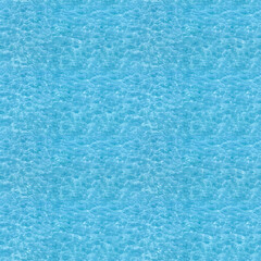 Water ripple seamless background texture - top view of clean, clear, blue water ripples. Image can...