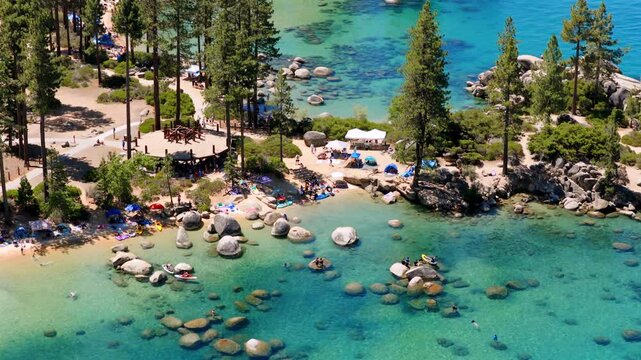 Lake Tahoe - Aerial View of Families Playing on Beach and in Water at Sand Harbor - CounterClockwise Rotation
