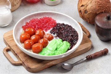 Bubur Madura atau Bubur Campur. Madura porridge is porridge with a sweet taste that contains a...