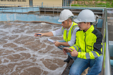 Environmental engineers work at wastewater treatment plants,Water supply engineering working at...