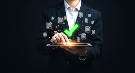 Person using tablet with checkmark and document icons in dark suit on black background digital approval