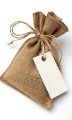 A burlap sack tied with twine and a blank tag on a white background