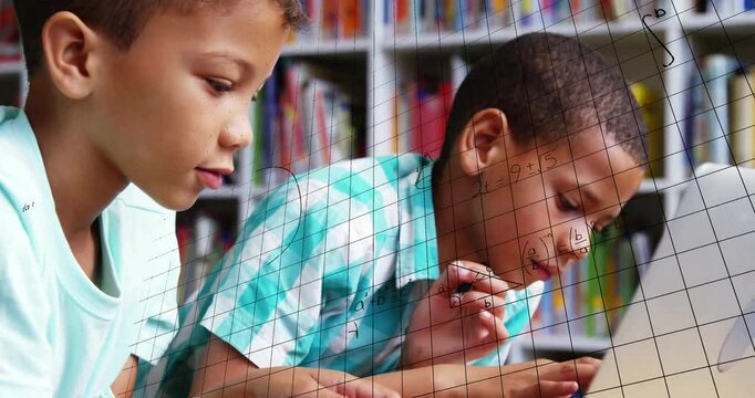 Two boys tapping touchscreen animating grid lines and math formulas for educational collaboration