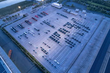 aerial view cars stopped on parking lot
