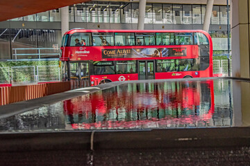 London Red Bus Water Feature Reflection