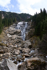 Neustift im Stubaital, Austria - April 20, 2025 - Grawa Observatory - waterfall in the Stubai Valley at Easter time