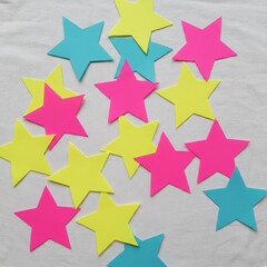 Obraz premium Colorful Star-Shaped Paper Cutouts for Kids Crafts, Decorations, and Educational Activities