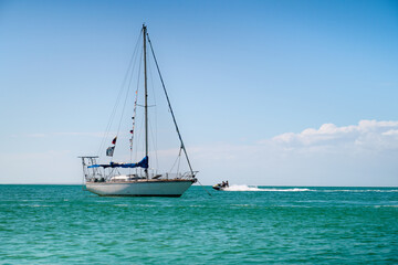 Sailing on the turquoise water of the Caribbean Sea. Paradise island Coche.	
