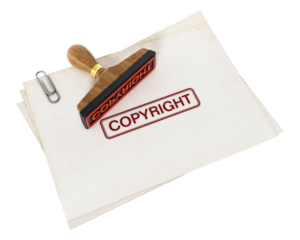 Copyright stamp standing on documents on transparent background. 3D illustration
