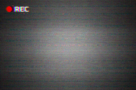 Retro CCTV or VHS video TV screen texture with glitch text REC. HDTV no signal problems. Bad TV signal on video screen white Noise of motion background scanlines. Glitch VHS. Video rewind texture