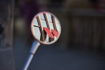 Small mirror of a scooter