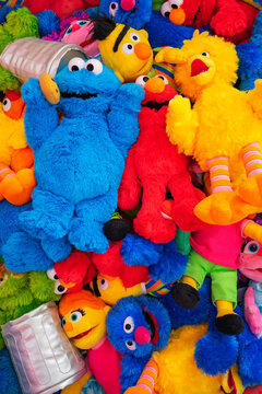 tokyo, ikebukuro - apr 16 2025: A bunch of American Sesame Street colorful plush toys of Elmo, Big Bird, and Cookie Monster in a Japanese toy store, captivating shoppers with nostalgia and charm.