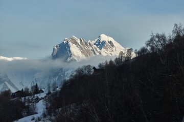 Mountains in winter, snowy alpine peaks