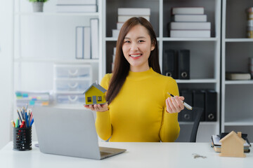 Real Estate Professional: A confident professional, positioned within a well-organized office...