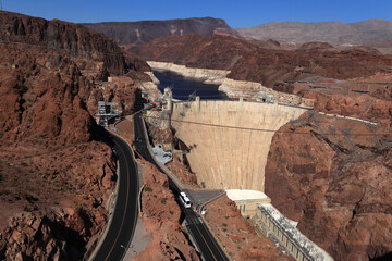 View of Hoover Dam and the Colorado River. The canyon is clearly visible. On the sides are the...