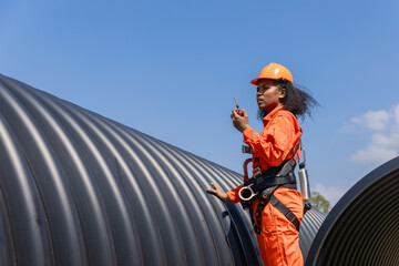 Industry Engineers Walking Inside Circular water Pipe. Engineering or Worker inspection pipe...