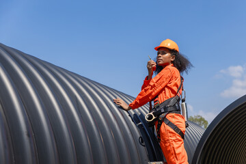 Industry Engineers Walking Inside Circular water Pipe. Engineering or Worker inspection pipe...