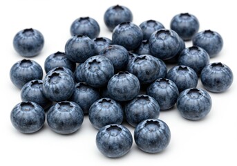A heap of fresh blueberries are isolated against a bright white background