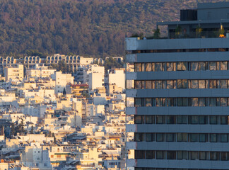 Landscape in Athens with skyscraper in view under sunset colors. Athens, Greece